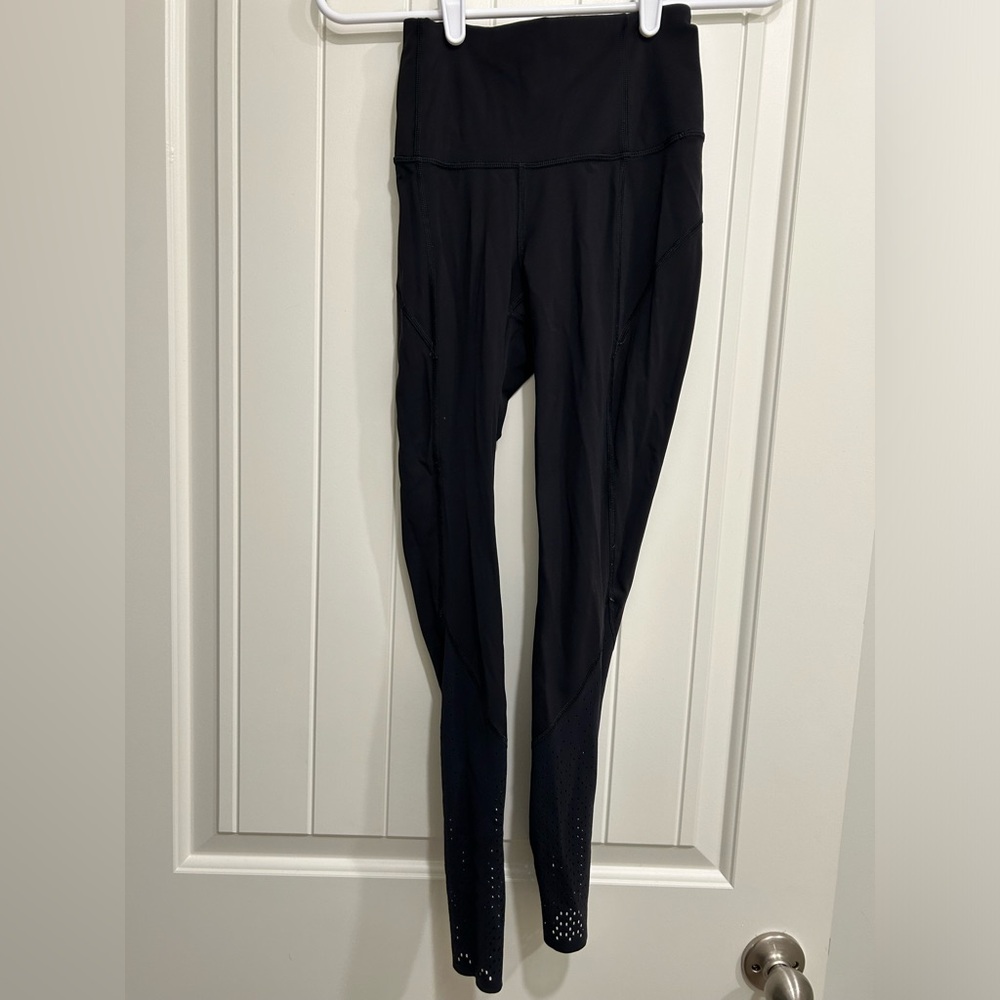 Lululemon Black Leggings Size 2 with Cutouts Below Knee